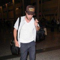 Robert Pattinson arrives at Toronto's Pearson International Airport